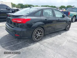 2015 Ford Focus SE with VIN 1FADP3F21FL209221, listed as a IAAI auction lot 42716293 with 100,465 mi miles and . Bid and sale history available at DreamBid. Image 4.