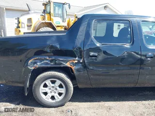 2007 Honda Ridgeline RTL w/Leather with VIN 2HJYK165X7H548322, listed as a IAAI auction lot 41983105 with 152,292 mi miles. Bid and sale history available at carsss.com. Image 6.