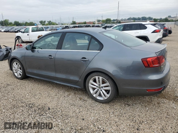 2014 Volkswagen Jetta GLI z VIN 3VW4T7AJ2EM245201, wystawiony jako Copart lot #64901935 z przebiegiem 147 799 mil mil oraz Czysty tytuł • Clean title. Historia ofert i sprzedaży dostępna na DreamBid. Obrazek 2.