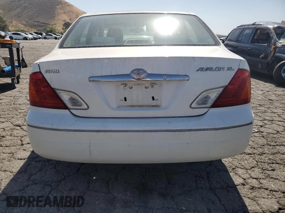 2000 Toyota Avalon XL z VIN 4T1BF28BXYU091688, wystawiony jako Copart lot #58162705 z przebiegiem 177 427 mil mil oraz Szkoda całkowita • Salvage title. Historia ofert i sprzedaży dostępna na DreamBid. Obrazek 6.
