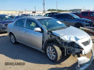 2009 Toyota Corolla with VIN JTDBL40E999021621, listed as a IAAI auction lot 41636462 with 123,650 mi miles. Bid and sale history available at carsss.com. Image 1.