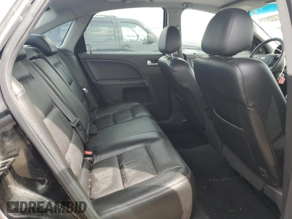 2006 Ford Five Hundred Limited z VIN 1FAFP28146G165585, wystawiony jako Copart lot #57722995 z przebiegiem 201 490 mil mil oraz Nie do naprawy. Historia ofert i sprzedaży dostępna na DreamBid. Obrazek 10.