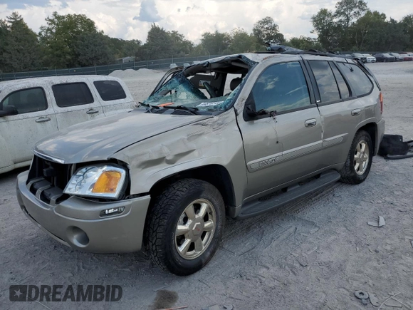 2002 GMC Envoy SLT with VIN 1GKDT13SX22380133, listed as a Copart auction lot 69816144 with 90,060 mi miles and Salvage Title. Bid and sale history available at DreamBid. Image 1.