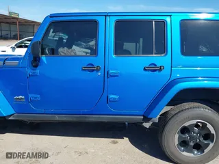 2014 Jeep Wrangler Unlimited Sahara with VIN 1C4HJWEG1EL188445, listed as a IAAI auction lot 41654579 with 79,948 mi miles. Bid and sale history available at carsss.com. Image 14.