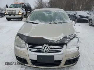 2009 Volkswagen Jetta S z VIN 3VWHM71KX9M075943, wystawiony jako Copart lot #88407595 z przebiegiem 171 244 mil mil oraz Szkoda całkowita • Salvage title. Historia ofert i sprzedaży dostępna na DreamBid. Obrazek 5.