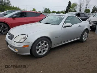 2002 Mercedes-Benz SLK 230 Kompressor z VIN WDBKK49F02F251021, wystawiony jako Copart lot #59564235 z przebiegiem 140 739 mil mil oraz Czysty tytuł • Clean title. Historia ofert i sprzedaży dostępna na DreamBid. Obrazek 1.