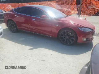 2014 Tesla Model S 60 z VIN 5YJSA1H19EFP27946, wystawiony jako Copart lot #61284625 z przebiegiem 109 147 mil mil oraz Szkoda całkowita • Salvage title. Historia ofert i sprzedaży dostępna na DreamBid. Obrazek 4.