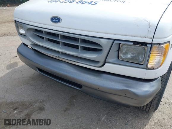 2000 Ford Econoline Cargo with VIN 1FTRE14W1YHB19251, listed as a IAAI auction lot 42114841 with 164,139 mi miles. Bid and sale history available at carsss.com. Image 6.