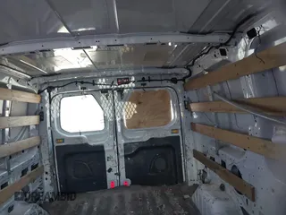 2015 Ford Transit Cargo with VIN 1FTNR1ZM9FKA56829, listed as a IAAI auction lot 42016014 with 261,768 mi miles. Bid and sale history available at carsss.com. Image 8.
