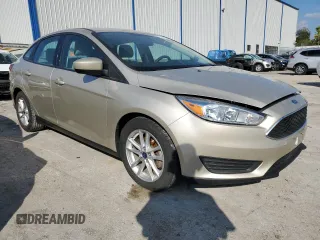2018 Ford Focus SE z VIN 1FADP3FE8JL331853, wystawiony jako Copart lot #74013984 z przebiegiem 73 237 mil mil oraz Szkoda całkowita • Salvage title. Historia ofert i sprzedaży dostępna na DreamBid. Obrazek 4.