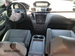 2014 Honda Odyssey Touring with VIN 5FNRL5H97EB016624, listed as a Copart auction lot 53444645 with 244,126 mi miles and Salvage Title. Bid and sale history available at DreamBid. Image 8.