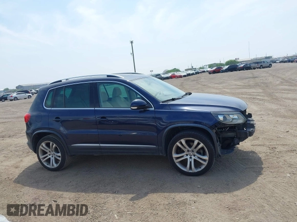 2012 Volkswagen Tiguan SEL with VIN WVGAV7AX8CW536752, listed as a IAAI auction lot 41798619 with 128,223 mi miles and . Bid and sale history available at DreamBid. Image 13.