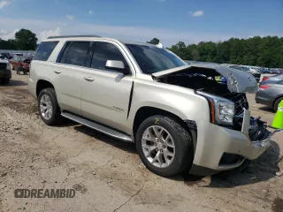 2015 GMC Yukon SLE with VIN 1GKS1AKCXFR684096, listed as a Copart auction lot 58341364 with 0 mi miles and Salvage Title. Bid and sale history available at carsss.com. Image 4.