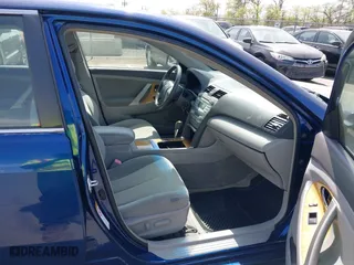 2007 Toyota Camry CE with VIN JTNBE46K373056707, listed as a IAAI auction lot 42128026 with 242,887 mi miles. Bid and sale history available at carsss.com. Image 5.