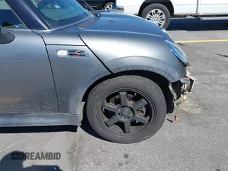 2005 MINI Convertible S with VIN WMWRH33545TF85051, listed as a IAAI auction lot 41843147 with 109,656 mi miles and . Bid and sale history available at DreamBid. Image 16.