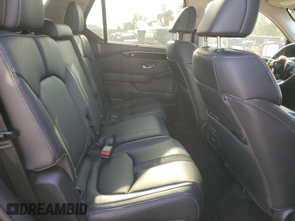 2023 Honda Pilot Touring with VIN 5FNYG2H77PB006594, listed as a Copart auction lot 83662854 with 37,637 mi miles and Salvage Title. Bid and sale history available at DreamBid. Image 11.