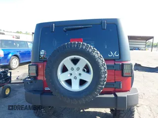2011 Jeep Wrangler Unlimited Sport with VIN 1J4BA3H18BL598323, listed as a IAAI auction lot 41958043 with 154,354 mi miles. Bid and sale history available at carsss.com. Image 16.