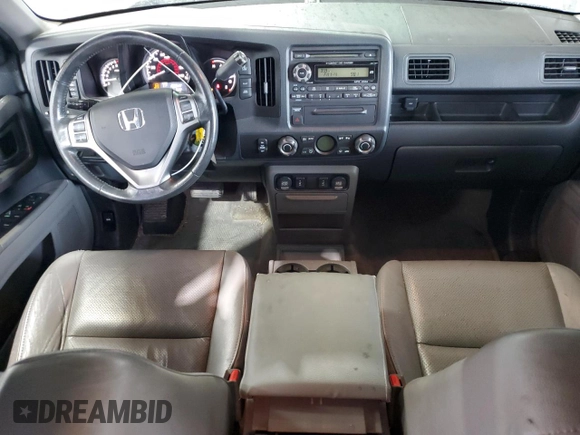 2010 Honda Ridgeline RTL z VIN 5FPYK1F53AB006195, wystawiony jako Copart lot #52528435 z przebiegiem 205 522 mil mil oraz Szkoda całkowita • Salvage title. Historia ofert i sprzedaży dostępna na DreamBid. Obrazek 8.