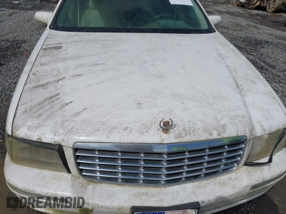 1999 Cadillac DeVille z VIN 1G6KD54Y5XU780836, wystawiony jako IAAI lot #41986180 z przebiegiem Nie podano mil oraz . Historia ofert i sprzedaży dostępna na DreamBid. Obrazek 6.