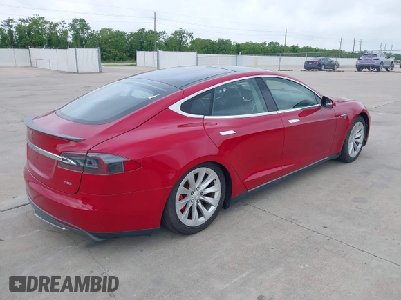 2014 Tesla Model S 60 with VIN 5YJSA1H17EFP30148, listed as a IAAI auction lot 39188024 with Not Provided miles and . Bid and sale history available at DreamBid. Image 4.