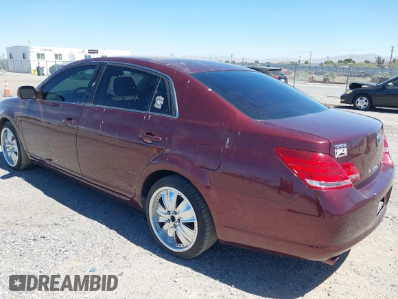 2006 Toyota Avalon XL with VIN 4T1BK36B36U087385, listed as a IAAI auction lot 41986866 with 128,594 mi miles. Bid and sale history available at carsss.com. Image 3.