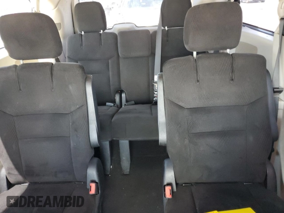 2014 Dodge Grand Caravan SXT z VIN 2C4RDGCG8ER428893, wystawiony jako Copart lot #56671355 z przebiegiem 261 815 mil mil oraz Szkoda całkowita • Salvage title. Historia ofert i sprzedaży dostępna na DreamBid. Obrazek 10.