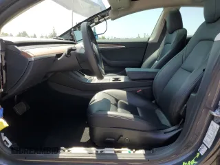 2023 Tesla Model 3 with VIN 5YJ3E1EA4PF615975, listed as a Copart auction lot 58845405 with 38,927 mi miles and Salvage title. Bid and sale history available at DreamBid. Image 7.