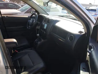 2011 Jeep Compass with VIN 1J4NT1FA4BD139153, listed as a IAAI auction lot 41665481 with 164,412 mi miles. Bid and sale history available at carsss.com. Image 5.