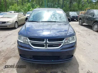 2018 Dodge Journey SE with VIN 3C4PDCAB7JT519491, listed as a IAAI auction lot 41974735 with 135,072 mi miles and . Bid and sale history available at DreamBid. Image 6.