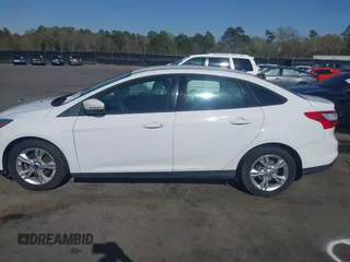 2013 Ford Focus SE with VIN 1FADP3F25DL223541, listed as a IAAI auction lot 41877904 with 192,484 mi miles and . Bid and sale history available at DreamBid. Image 14.