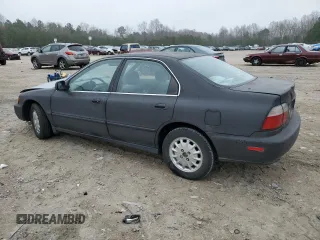 1997 Honda Accord EX with VIN 1HGCD5651VA019340, listed as a Copart auction lot 83451114 with 214,604 mi miles and Salvage Title. Bid and sale history available at DreamBid. Image 2.