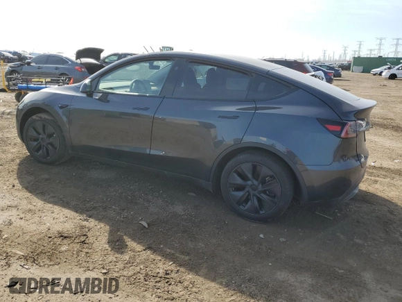 2024 Tesla Model Y with VIN 7SAYGDED7RF163537, listed as a Copart auction lot 48639255 with 7,193 mi miles and Salvage Title. Bid and sale history available at DreamBid. Image 2.