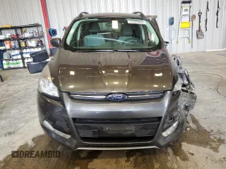 2016 Ford Escape SE z VIN 1FMCU9G99GUA67544, wystawiony jako Copart lot #57655935 z przebiegiem 156 913 mil mil oraz Nie do naprawy • Non repairable. Historia ofert i sprzedaży dostępna na DreamBid. Obrazek 5.