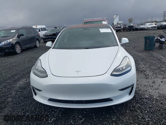 2018 Tesla Model 3 Long Range Battery with VIN 5YJ3E1EA3JF013253, listed as a IAAI auction lot 41752102 with 84,459 mi miles. Bid and sale history available at carsss.com. Image 12.