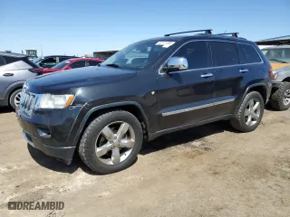 2011 Jeep Grand Cherokee Overland with VIN 1J4RR6GT4BC541497, listed as a Copart auction lot 52121595 with 143,010 mi miles and Clean Title. Bid and sale history available at carsss.com. Image 1.