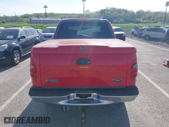 2003 Ford F-150 XLT with VIN 1FTRW08L43KD14456, listed as a IAAI auction lot 42098830 with 234,908 mi miles. Bid and sale history available at carsss.com. Image 17.
