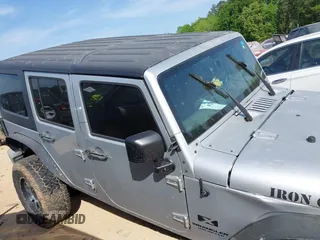 2007 Jeep Wrangler Unlimited X z VIN 1J4GA39137L114943, wystawiony jako IAAI lot #42080263 z przebiegiem Nie podano mil oraz . Historia ofert i sprzedaży dostępna na DreamBid. Obrazek 13.
