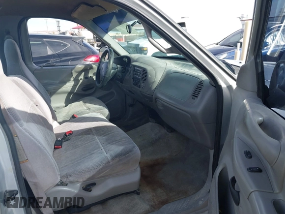 1997 Ford F-150 with VIN 1FTEF17W3VLA19510, listed as a IAAI auction lot 41711010 with 214,984 mi miles and . Bid and sale history available at DreamBid. Image 5.