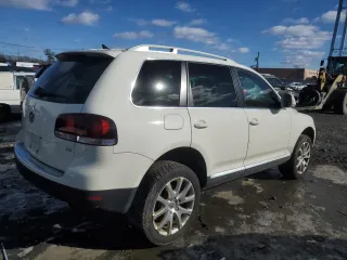 2010 Volkswagen Touareg VR6 with VIN WVGBF7A92AD003436, listed as a Copart auction lot 87545585 with 145,716 mi miles and Clean Title. Bid and sale history available at DreamBid. Image 3.