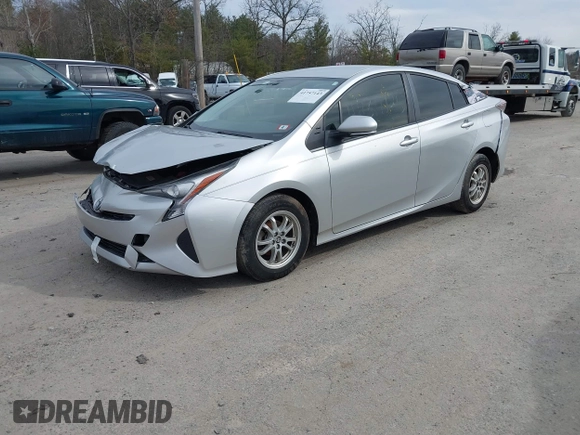 2016 Toyota Prius Two with VIN JTDKBRFUXG3023523, listed as a IAAI auction lot 41757143 with 124,144 mi miles. Bid and sale history available at carsss.com. Image 17.