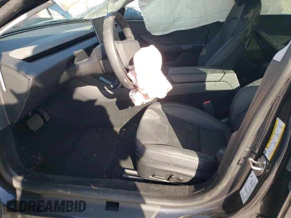 2024 Tesla Model 3 Long Range with VIN 5YJ3E1EB5RF788173, listed as a Copart auction lot 52053955 with 11,863 mi miles and Salvage Title. Bid and sale history available at DreamBid. Image 7.