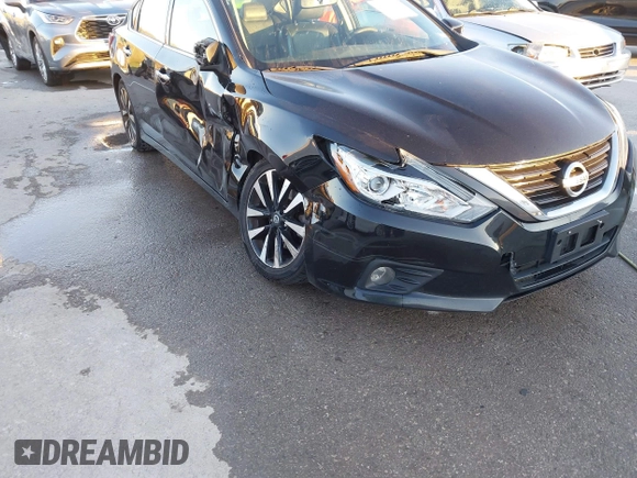 2018 Nissan Altima SR with VIN 1N4AL3AP7JC129741, listed as a IAAI auction lot 40923554 with 161,218 mi miles and . Bid and sale history available at carsss.com. Image 6.
