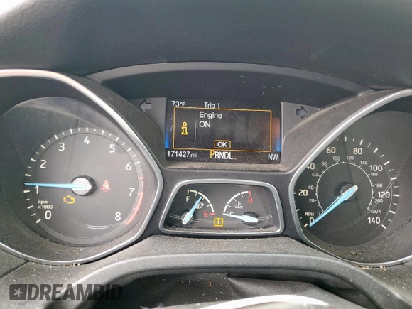 2015 Ford Focus SE z VIN 1FADP3F23FL243807, wystawiony jako Copart lot #60159605 z przebiegiem 171 427 mil mil oraz Czysty tytuł • Clean title. Historia ofert i sprzedaży dostępna na DreamBid. Obrazek 9.