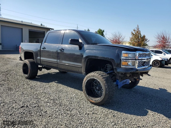 2015 Chevrolet Silverado 1500 LT with VIN 3GCUKREC3FG356823, listed as a Copart auction lot 73223684 with 148,139 mi miles and Salvage Title. Bid and sale history available at carsss.com. Image 4.