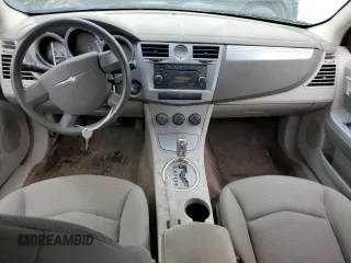 2007 Chrysler Sebring Touring z VIN 1C3LC56K57N527947, wystawiony jako Copart lot #52789485 z przebiegiem Nie podano mil oraz Szkody całkowita. Historia ofert i sprzedaży dostępna na DreamBid. Obrazek 8.