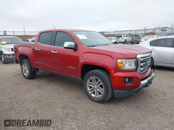 2015 GMC Canyon 2WD SLT with VIN 1GTG5CE3XF1211164, listed as a IAAI auction lot 41490387 with 163,932 mi miles. Bid and sale history available at carsss.com. Image 1.