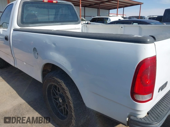 2004 Ford F-150 XL with VIN 2FTRF17WX4CA74272, listed as a IAAI auction lot 42657638 with 119,928 mi miles and . Bid and sale history available at DreamBid. Image 6.