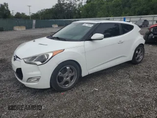 2012 Hyundai Veloster w/Black Int z VIN KMHTC6AD1CU030478, wystawiony jako Copart lot #62715005 z przebiegiem 127 625 mil mil oraz Szkoda całkowita • Salvage title. Historia ofert i sprzedaży dostępna na DreamBid. Obrazek 1.