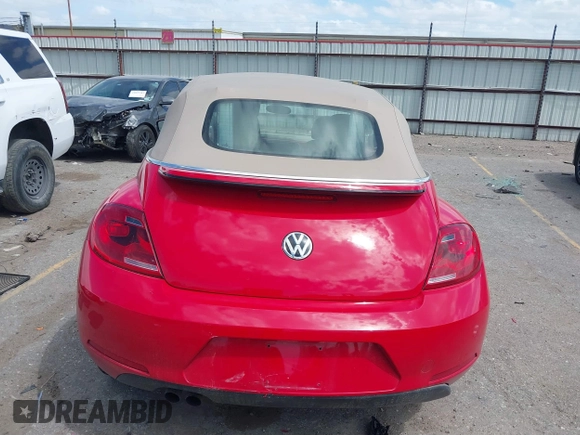 2015 Volkswagen Beetle 1.8T w/Tech with VIN 3VW517AT4FM803238, listed as a IAAI auction lot 41812373 with 42,369 mi miles and . Bid and sale history available at DreamBid. Image 16.