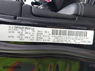 2014 Jeep Grand Cherokee Overland with VIN 1C4RJFCG6EC121654, listed as a IAAI auction lot 42051730 with 163,853 mi miles. Bid and sale history available at carsss.com. Image 9.